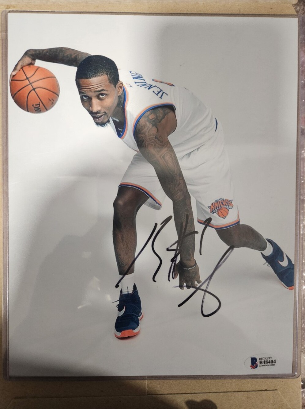 Beckett Simonon White Shorts with Blue & Orange Trim - Signed Basketball Photo